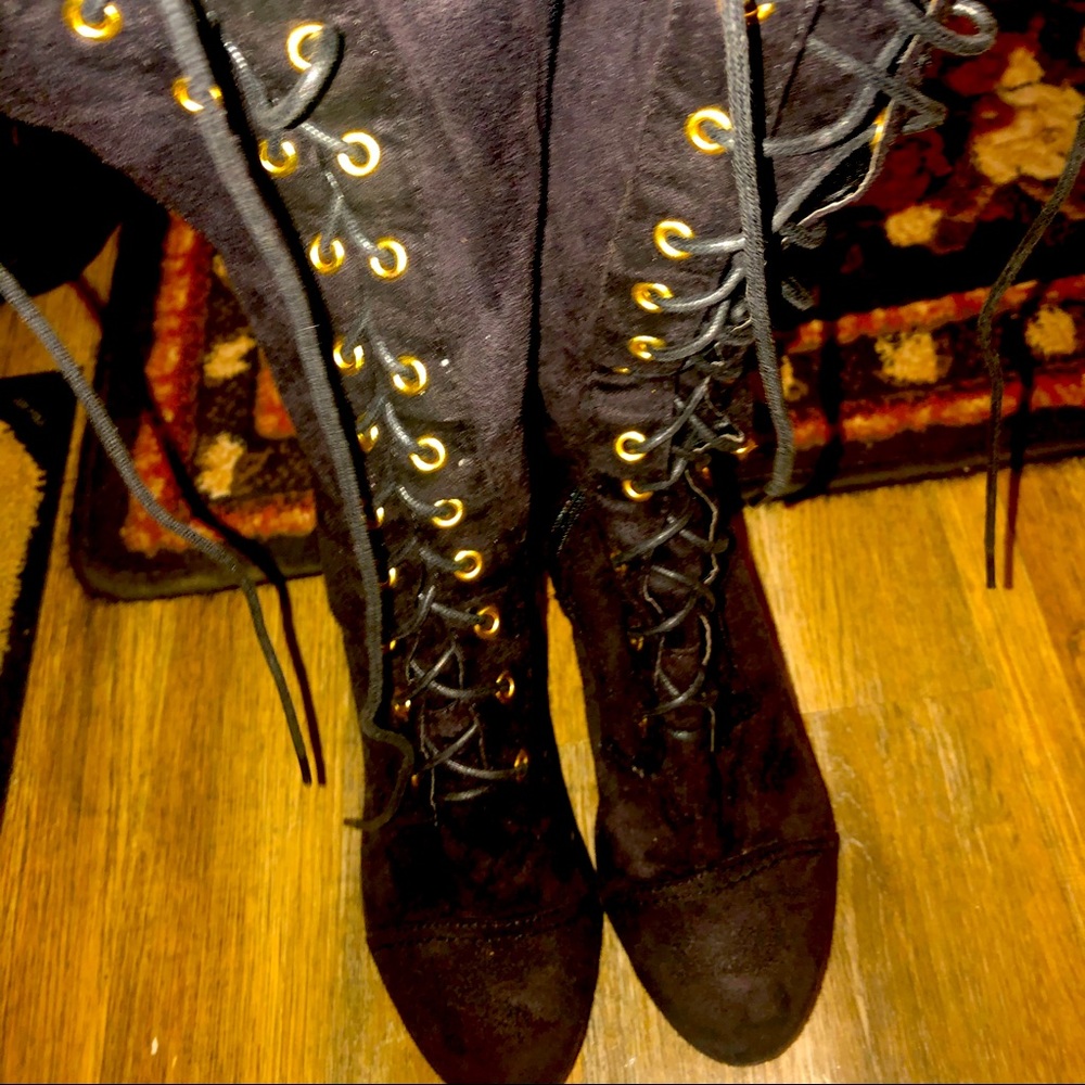 2 knee high heeled boots